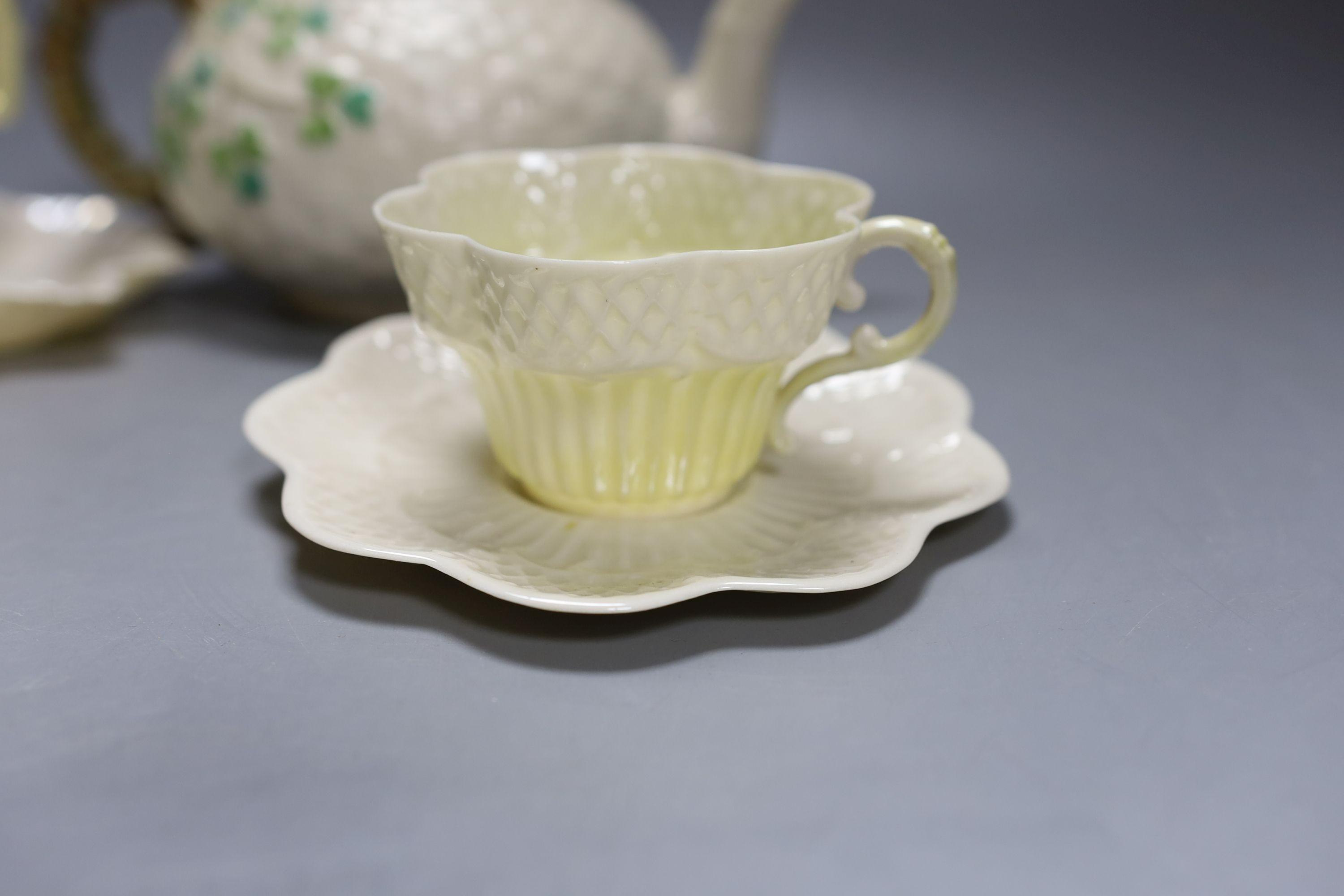 Matching Belleek sugar bowl milk jug and dish together with another Baleek cup and saucer and teapot (6)